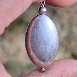 Simple and sophisticated vintage 925 sterling silver puffy oval necklace pendant